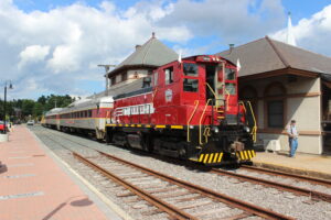 Historic red and cream passenger train at Granite State Railway station in Laconia NH.